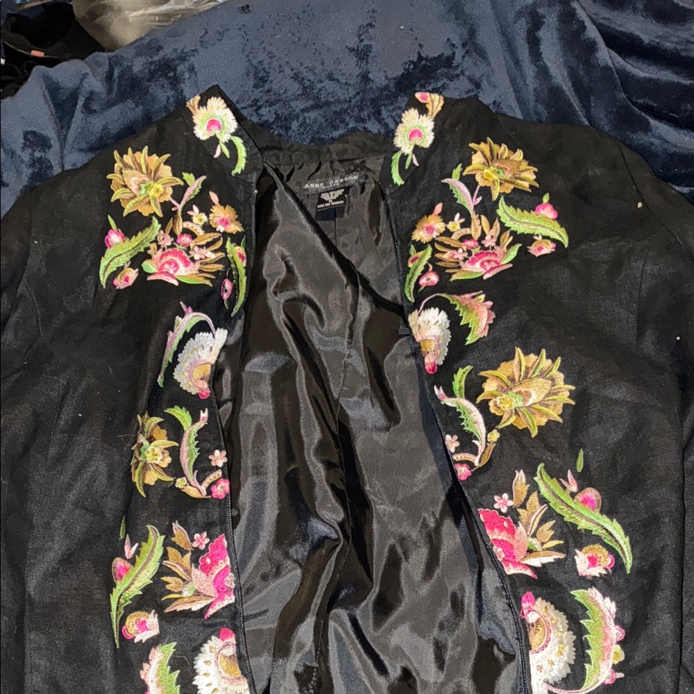 Anne Carson Black Bomber Jacket with Vibrant Floral Patterns